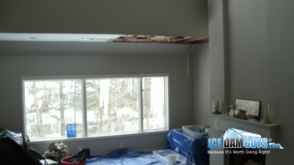 Ceiling collapse and damages from an ice dam that leaked through a customer's ceiling. Found by the Ice Dam Guys®.