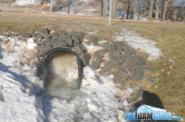 A frozen culvert - no water flowing, no drainage