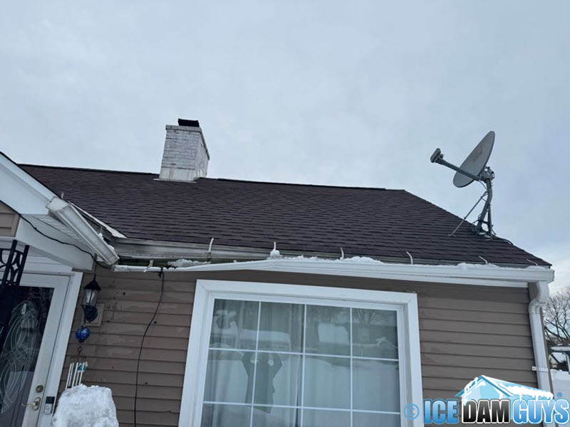 Damaged gutter and drip edge caused by ice dam, Upstate New York, February 2025