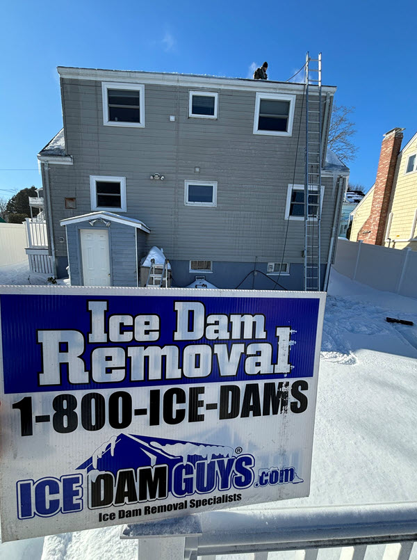 Steam ice dam removal in-progress on roof of Hyde Park home, January 2026
