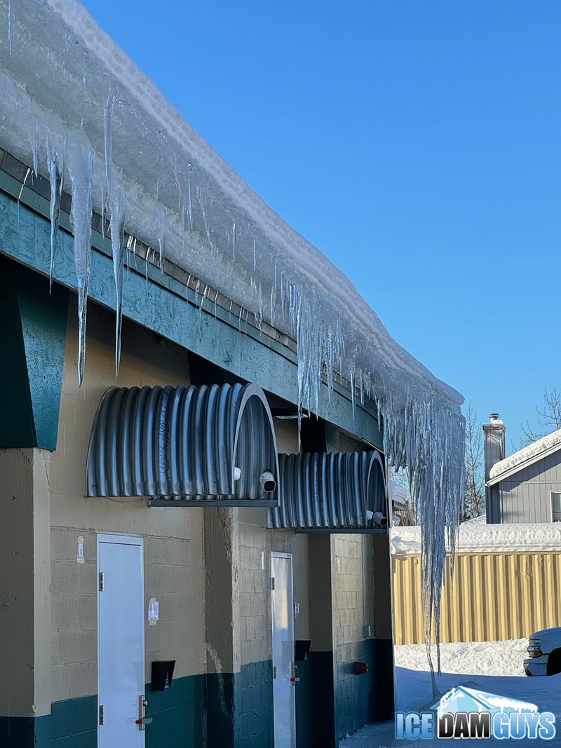 Ice dam and icicles on roof of Anchorage business
