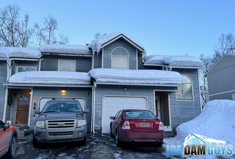 Heavy snow and ice on home in Anchorage