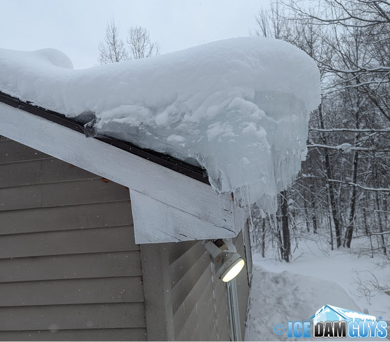 Ice dams on multiple stories of home in Northern Michigan,