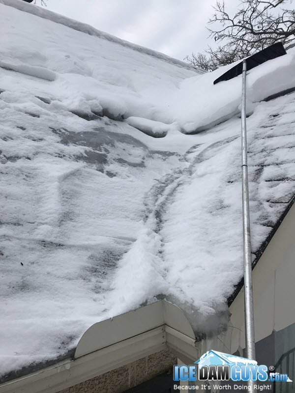 Removing snow and ice in roof valley